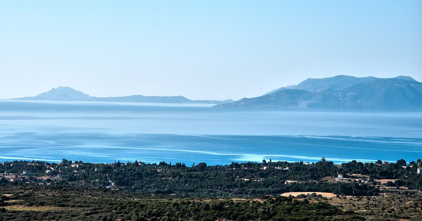 Olive groves and open countryside above the sea in Kefalonia