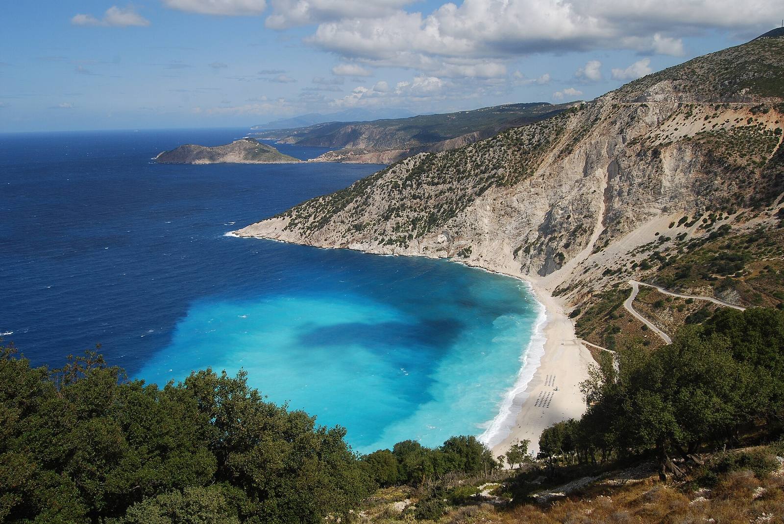 Myrtos beach in Kefalonia with turquoise water below steep white cliffs
